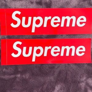 Two original Supreme decals